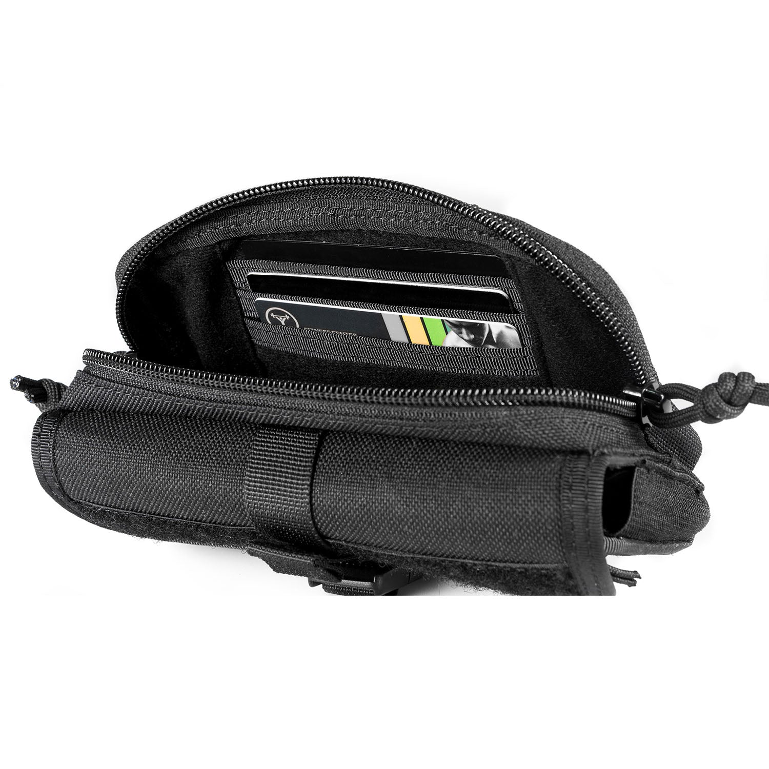 Black tactical pouch with a zipper, holding a smartphone and cards on a white background